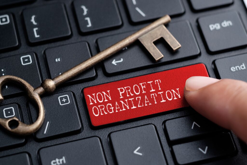 key to nonprofit marketing finger on keyboard with nonprofit organization spelled on key